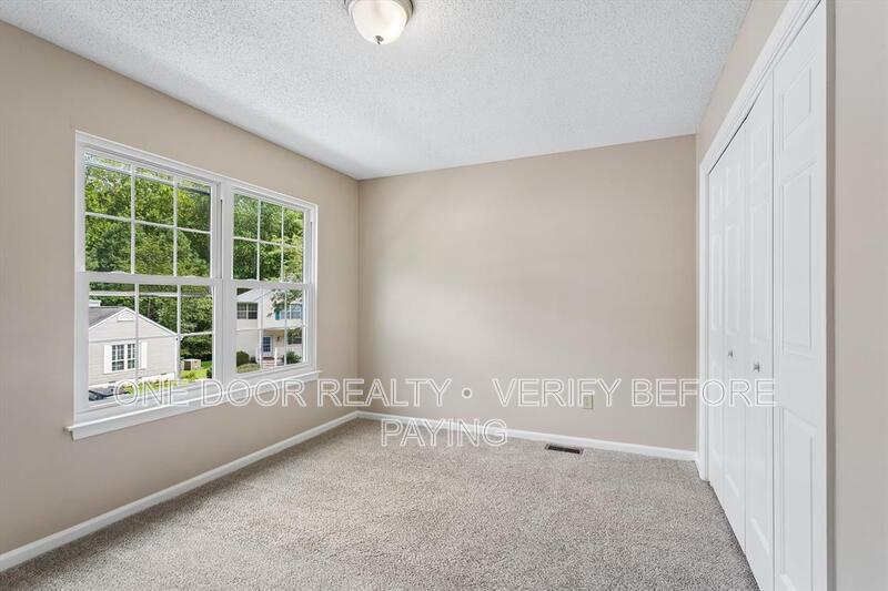 Spacious 3-Bedroom Home with Rear Deck & Wooded Setting property image